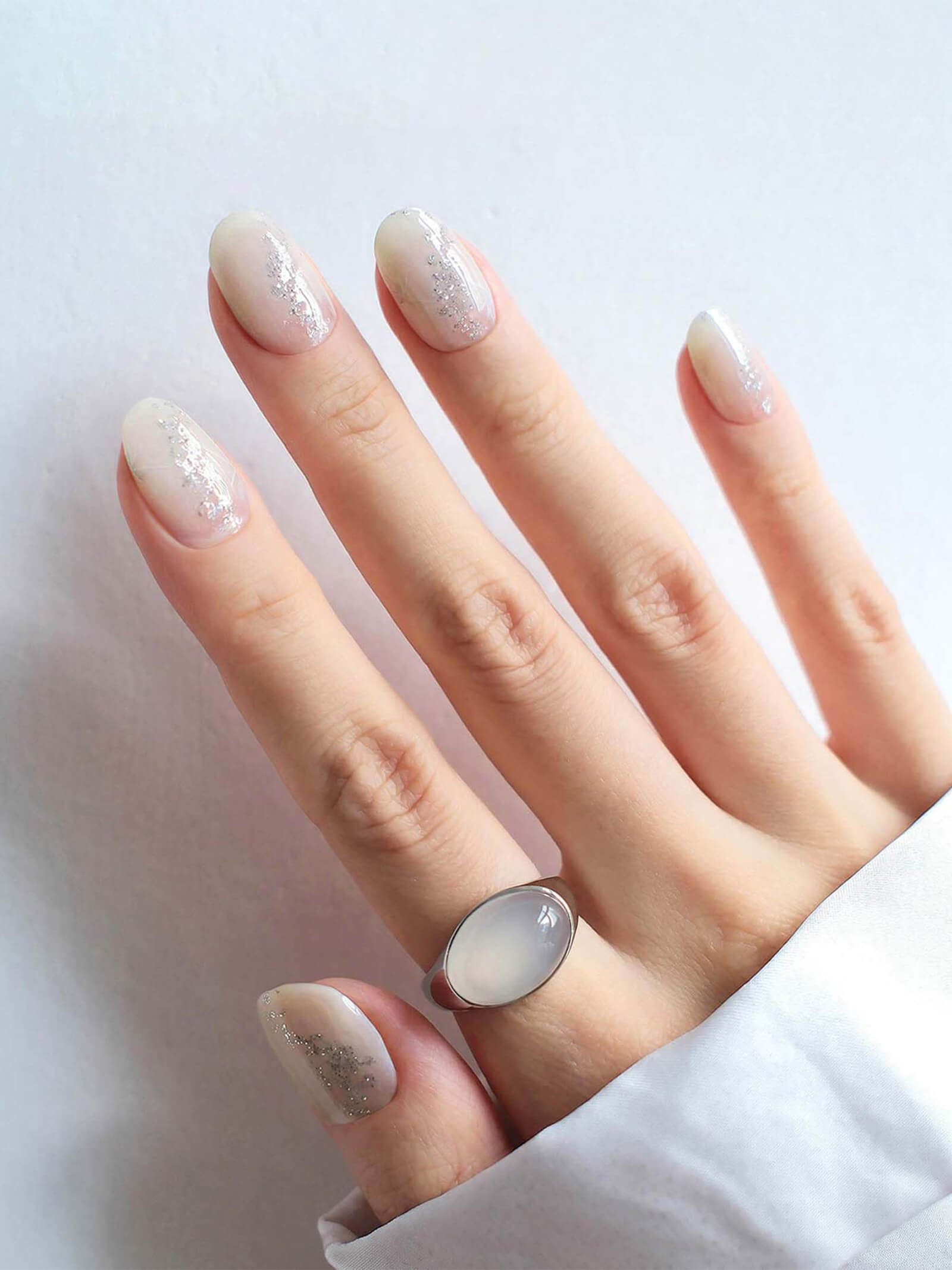 Elegant white ombre nail art stickers with fine glitter accents