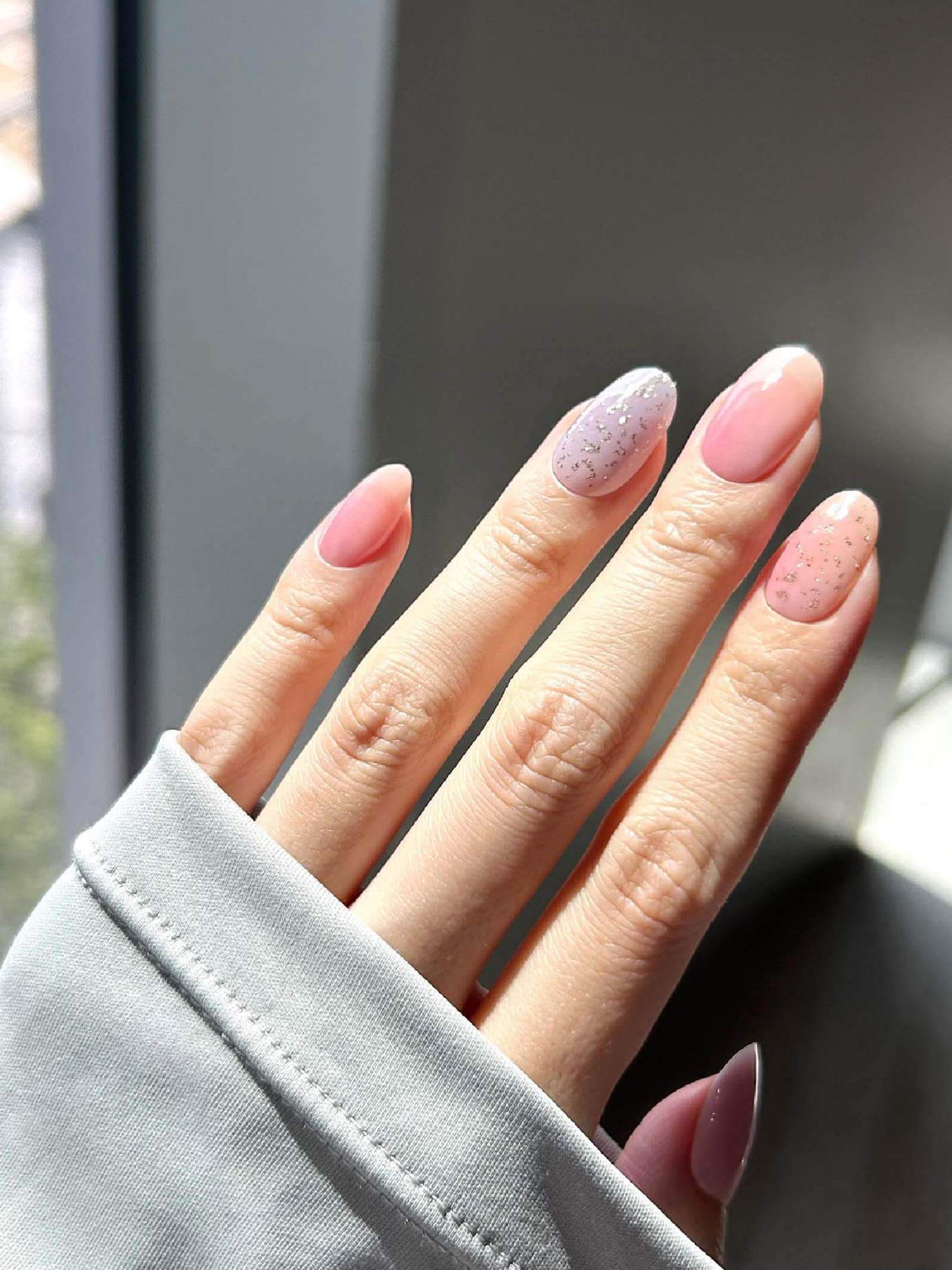 Modern pink and purple ombre gel nail stickers with a shimmering effect