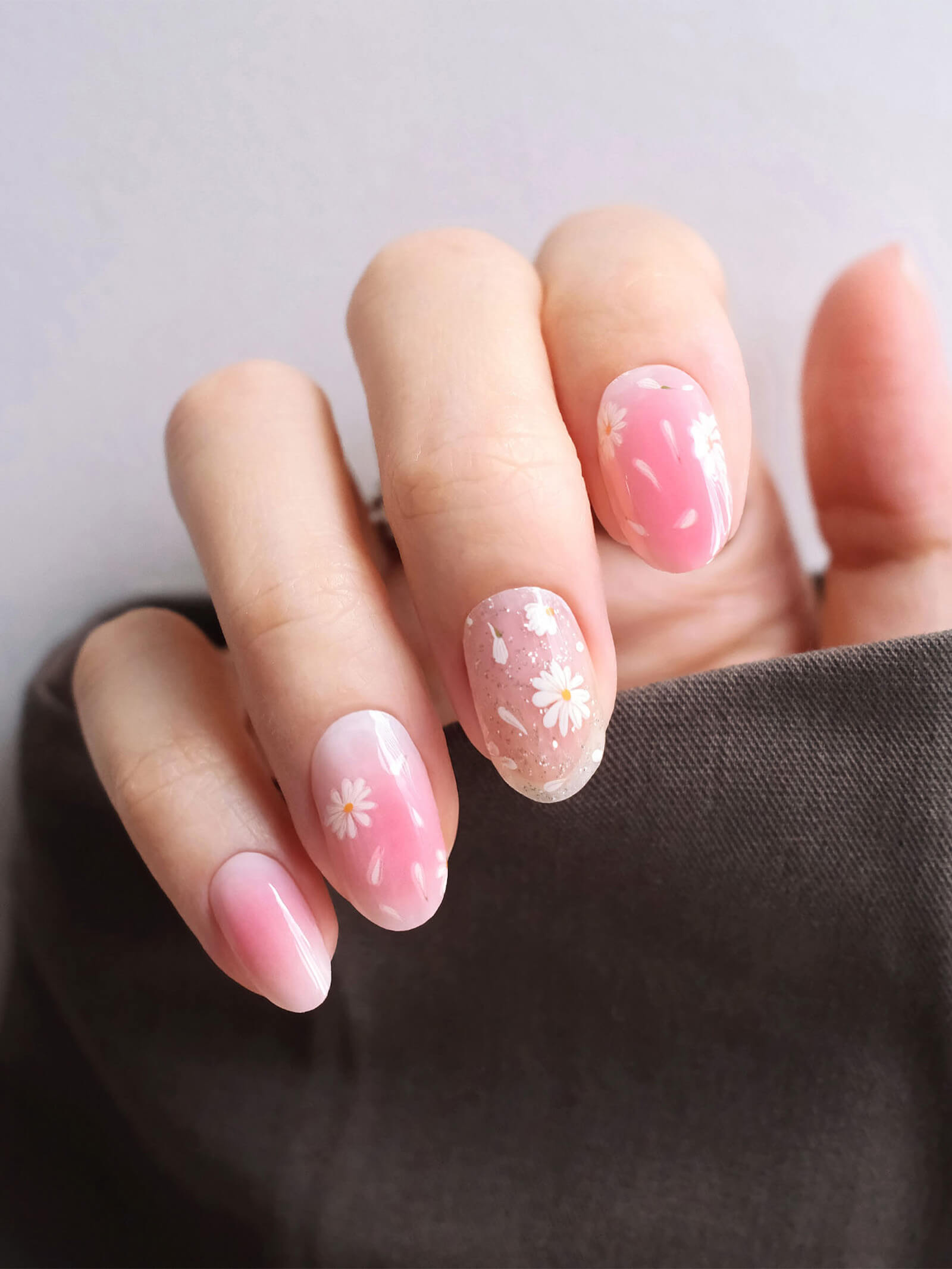 Graceful pink ombre gel nail stickers with white floral designs