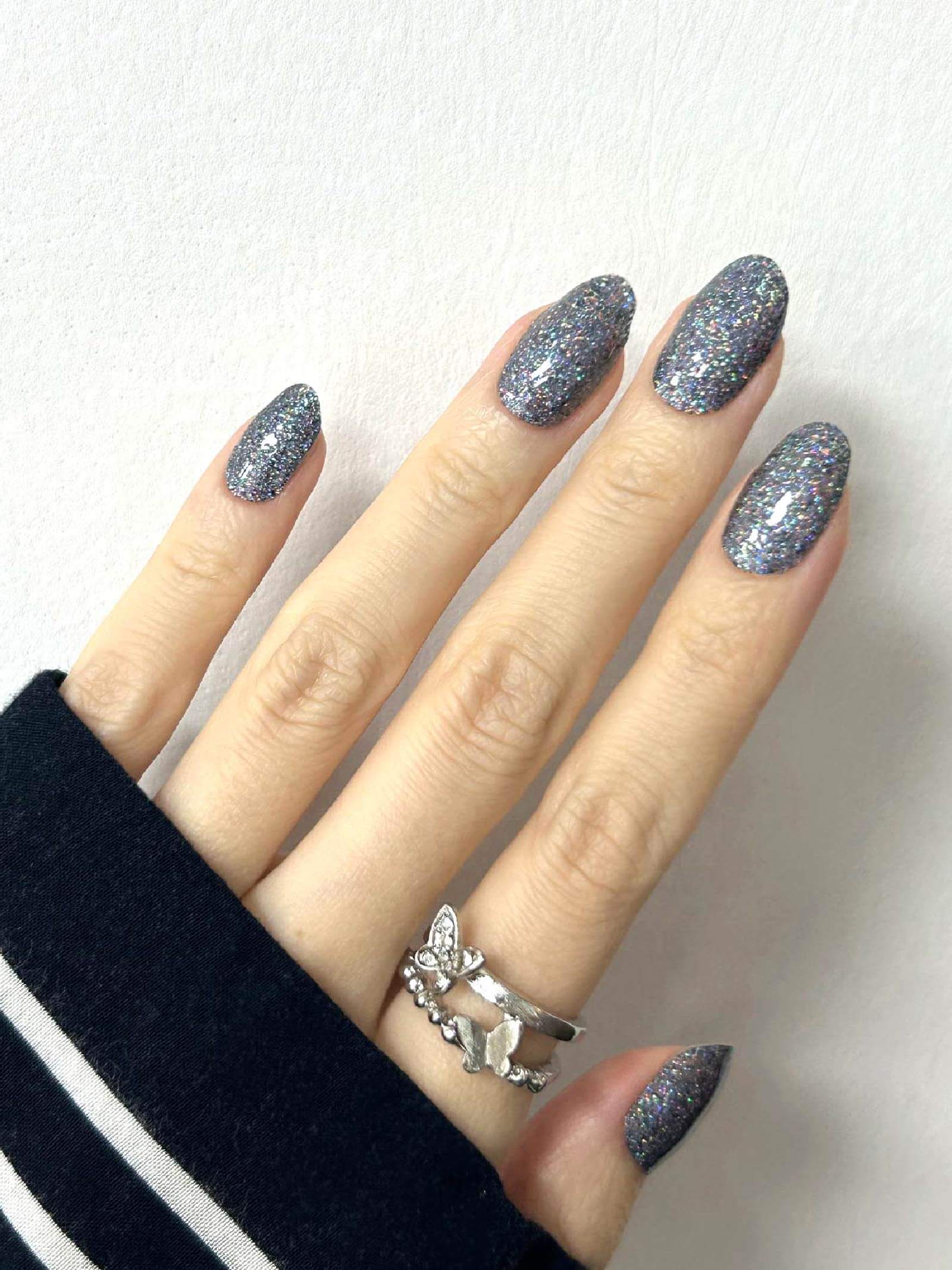 Elegant black gel nail stickers with multicolor shimmer