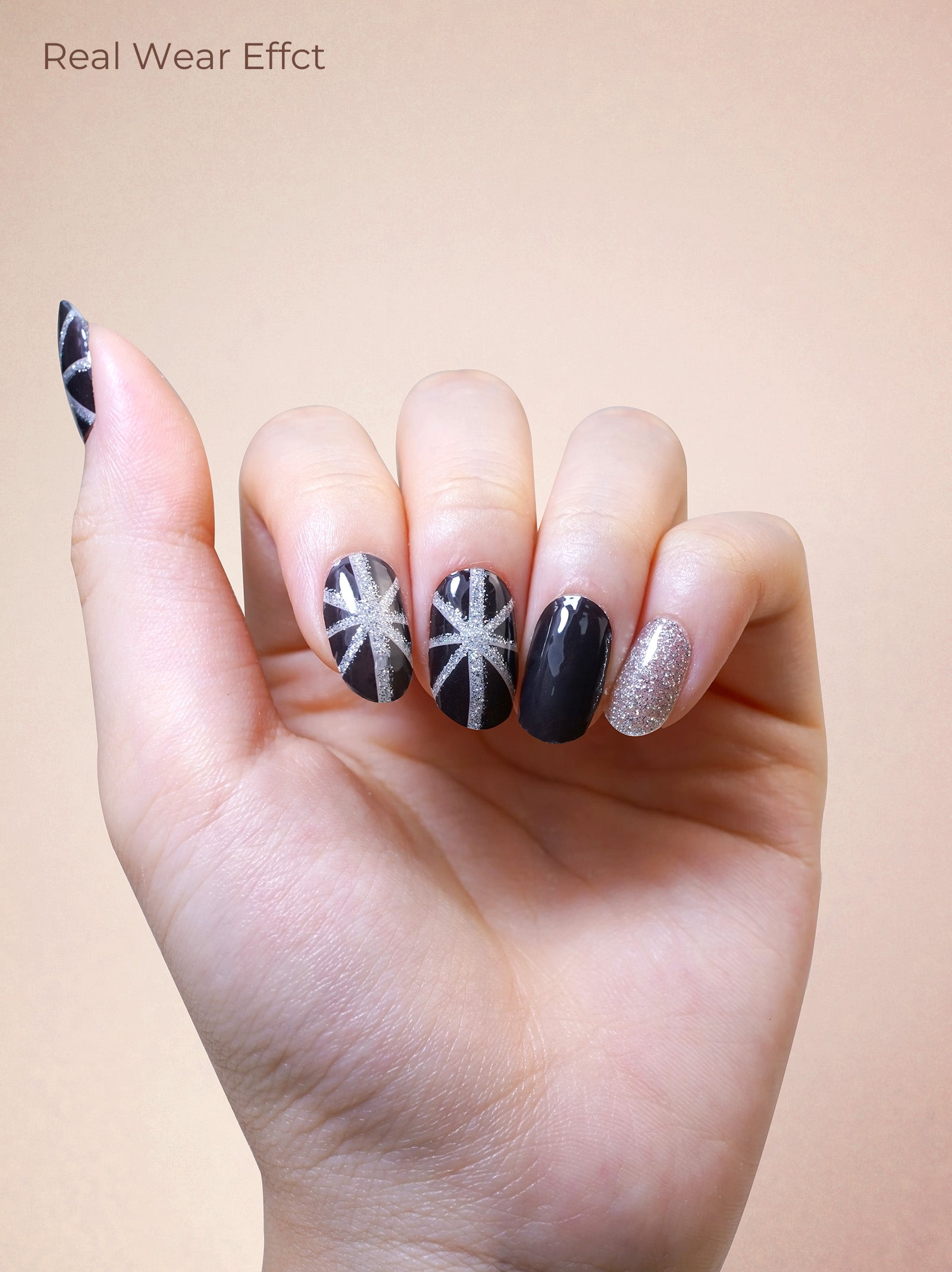 Bold black gel nail stickers with silver glitter art accents
