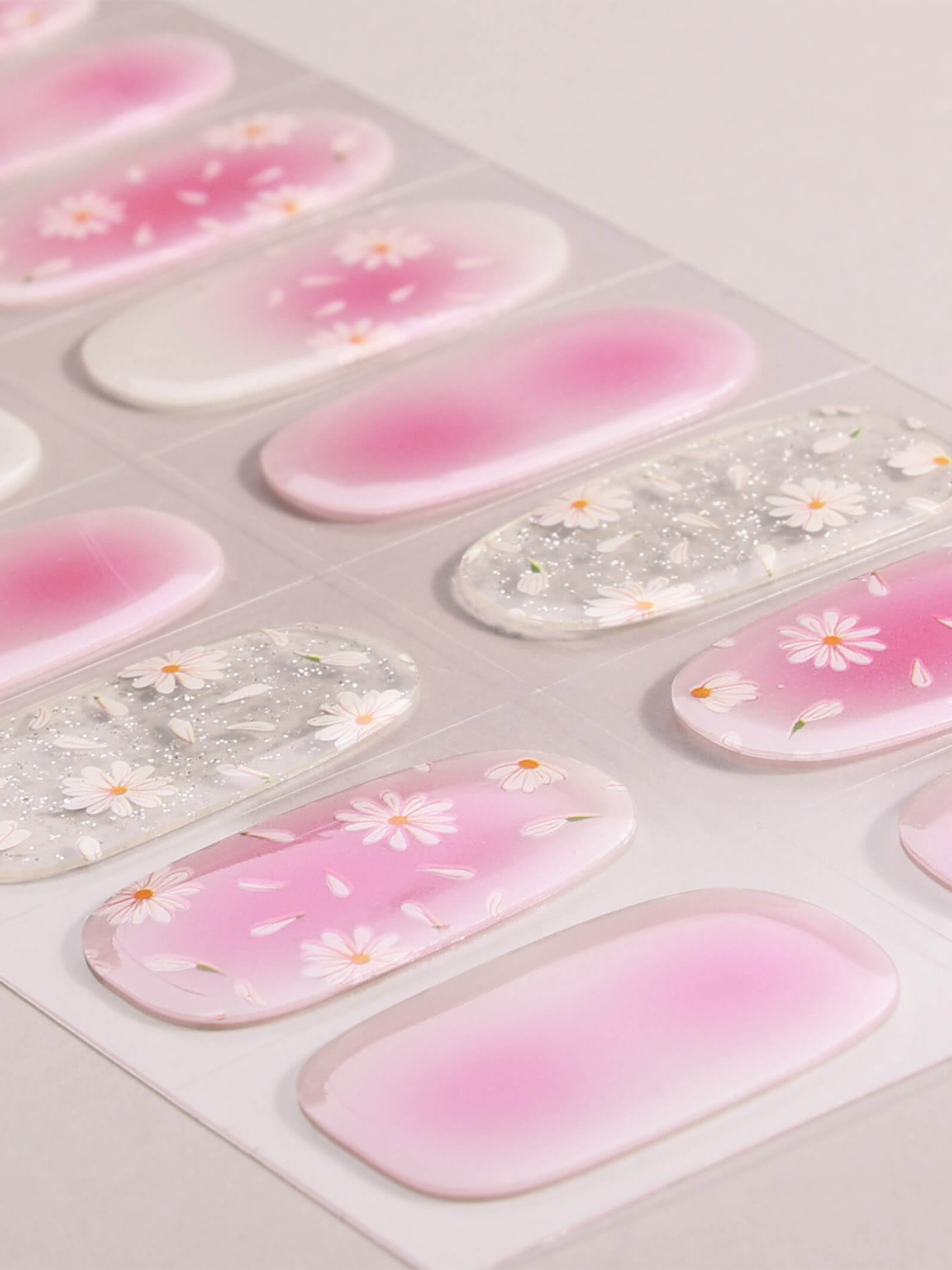 Sophisticated pink ombre gel nail stickers with white blossoms