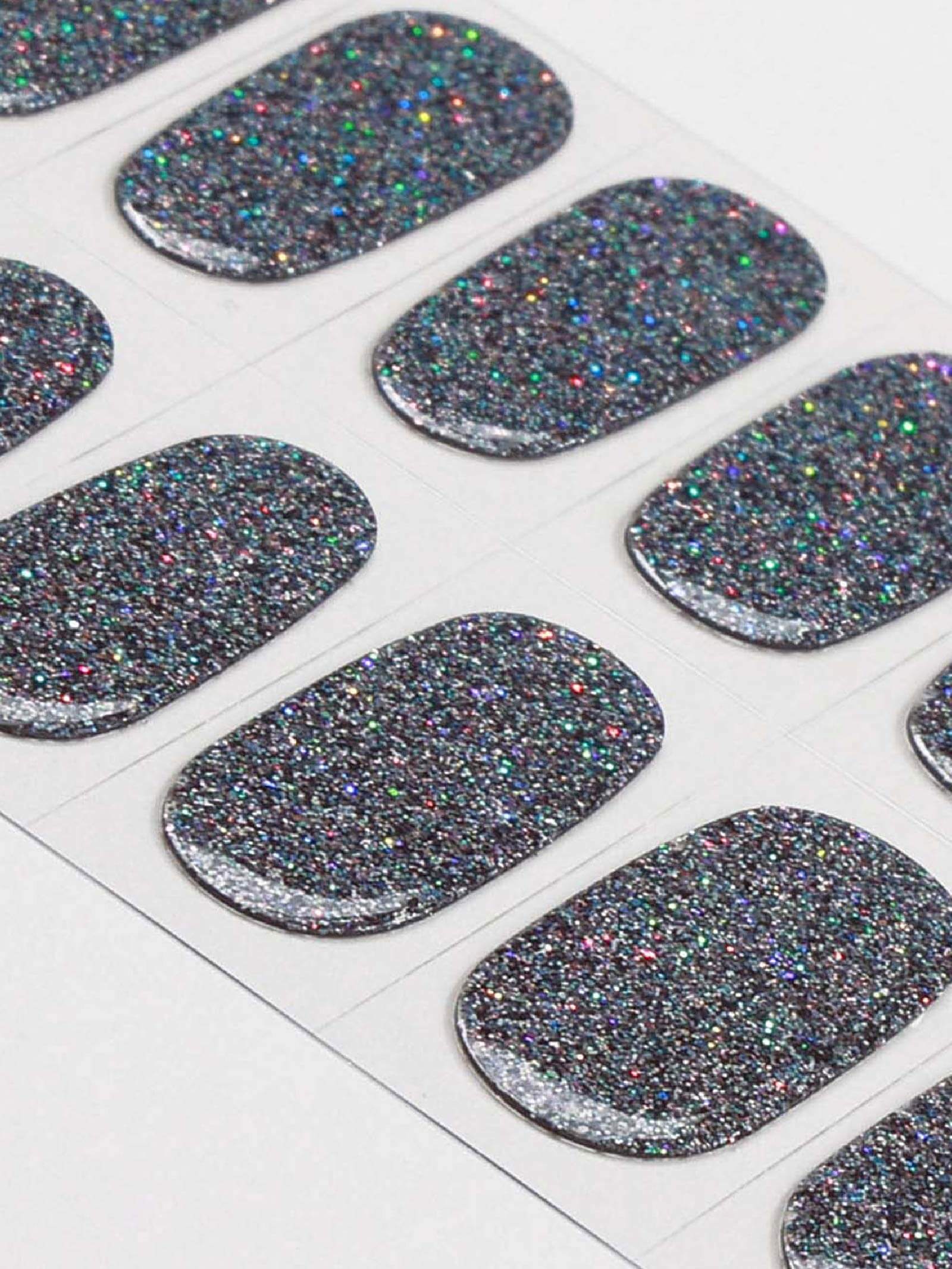 Chic black nail polish stickers with dazzling multicolor glitter