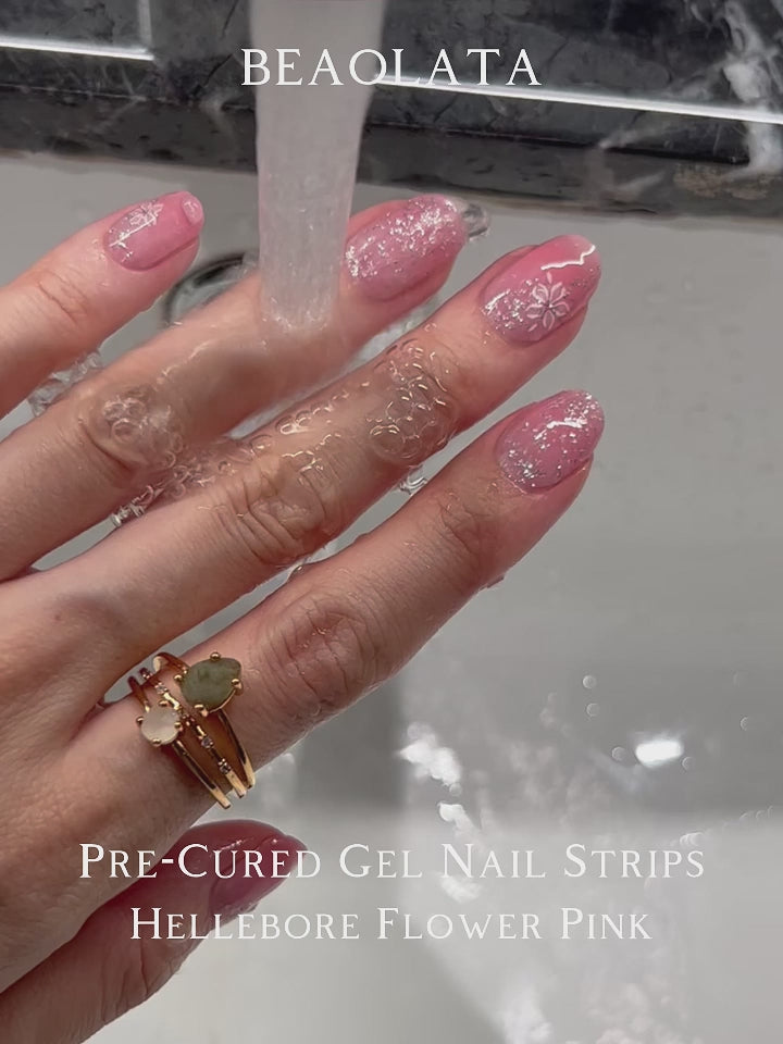 Soft pink gel nail stickers with white flower