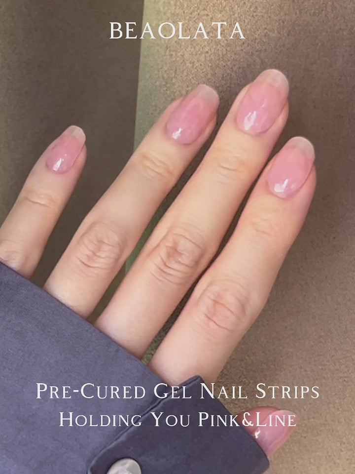 Soft pink gel nail stickers with modern stripe accents