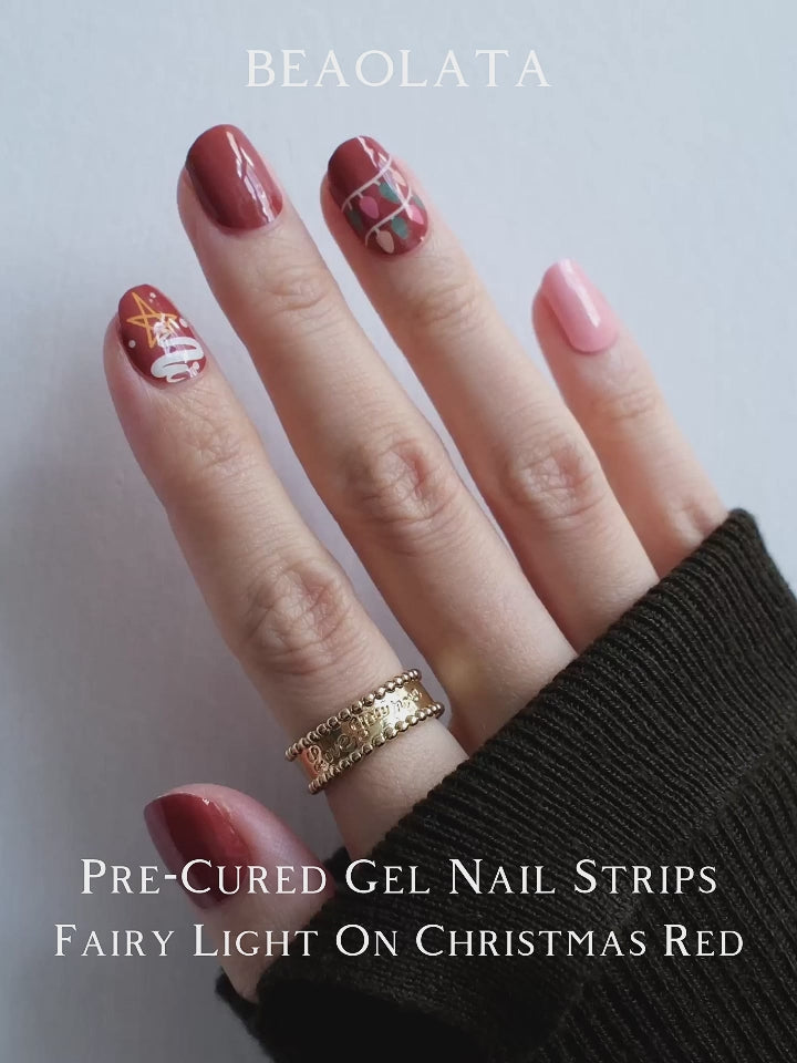 Christmas-inspired gel nail stickers with festive designs